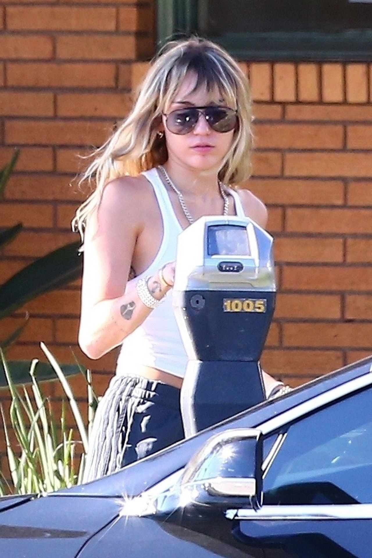 Miley Cyrus Braless 013