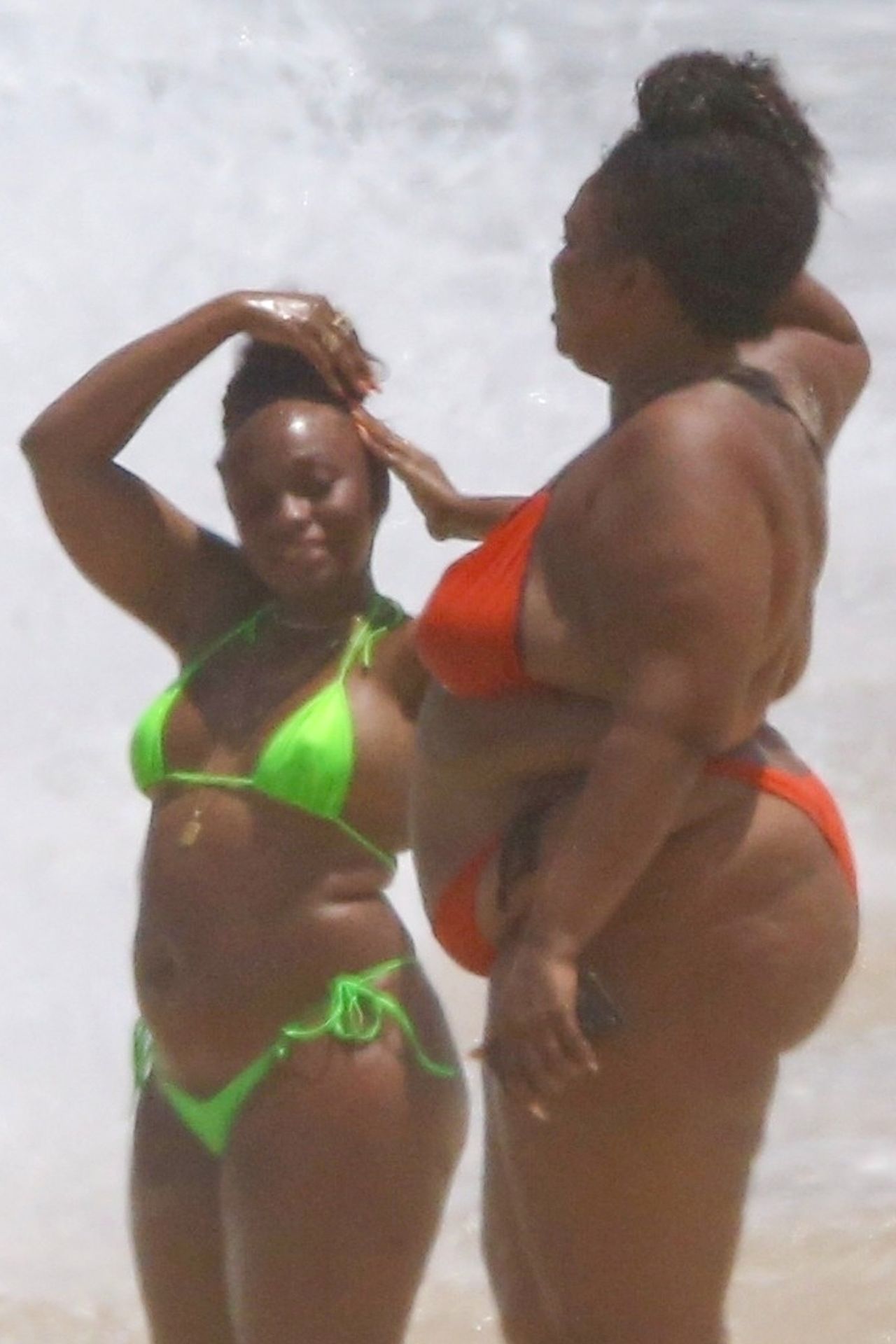 Feelin’ Good As Hell! Singer Lizzo And Her Girls Take Over The Beach In Rio 0023