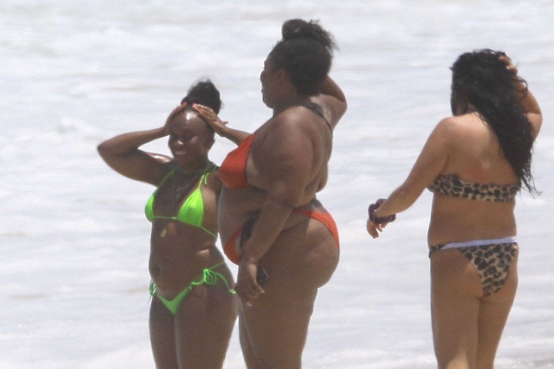 Feelin’ Good As Hell! Singer Lizzo And Her Girls Take Over The Beach In Rio 0055