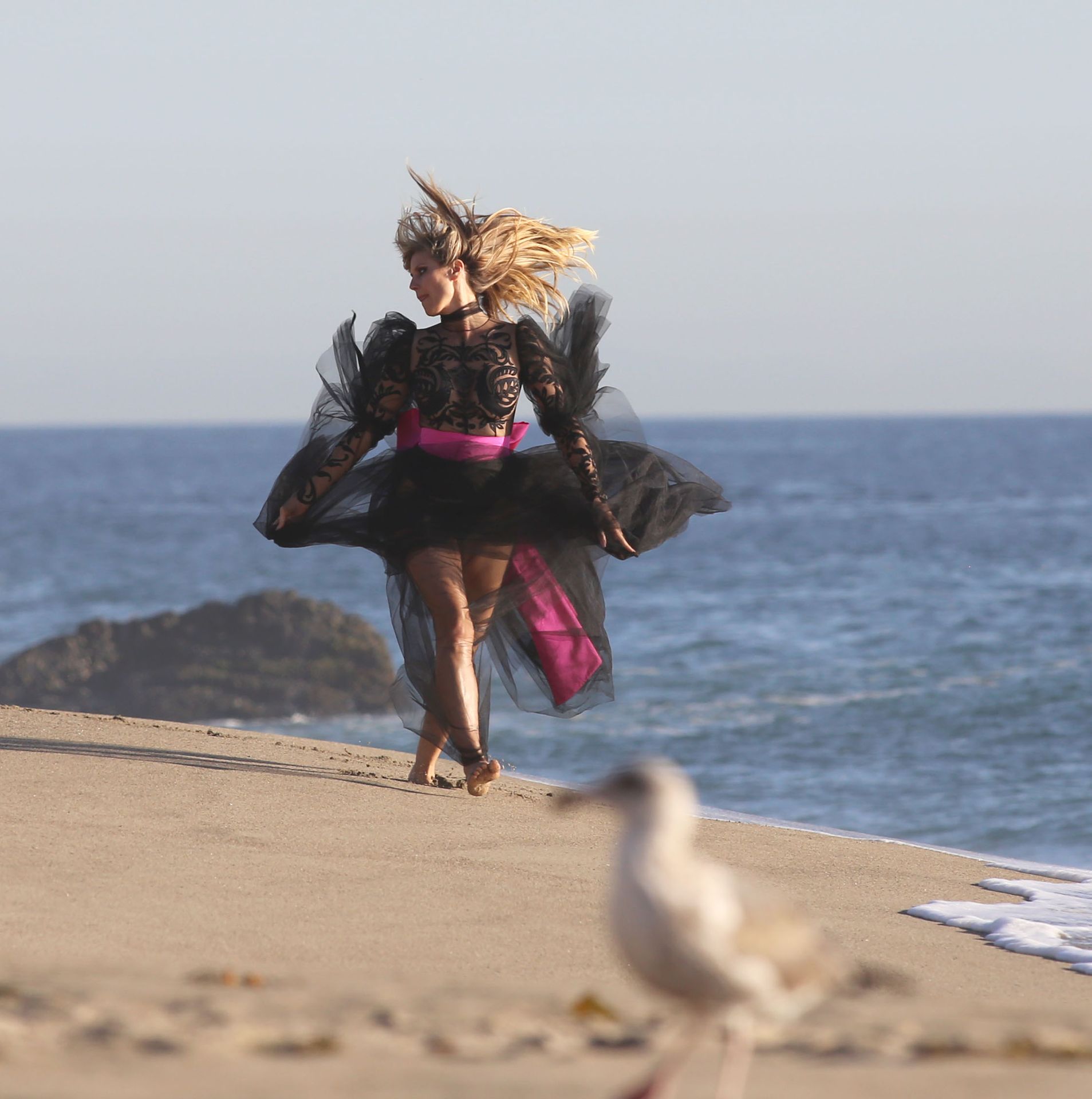 Heidi Klum Poses In A Thong Bikini 0001