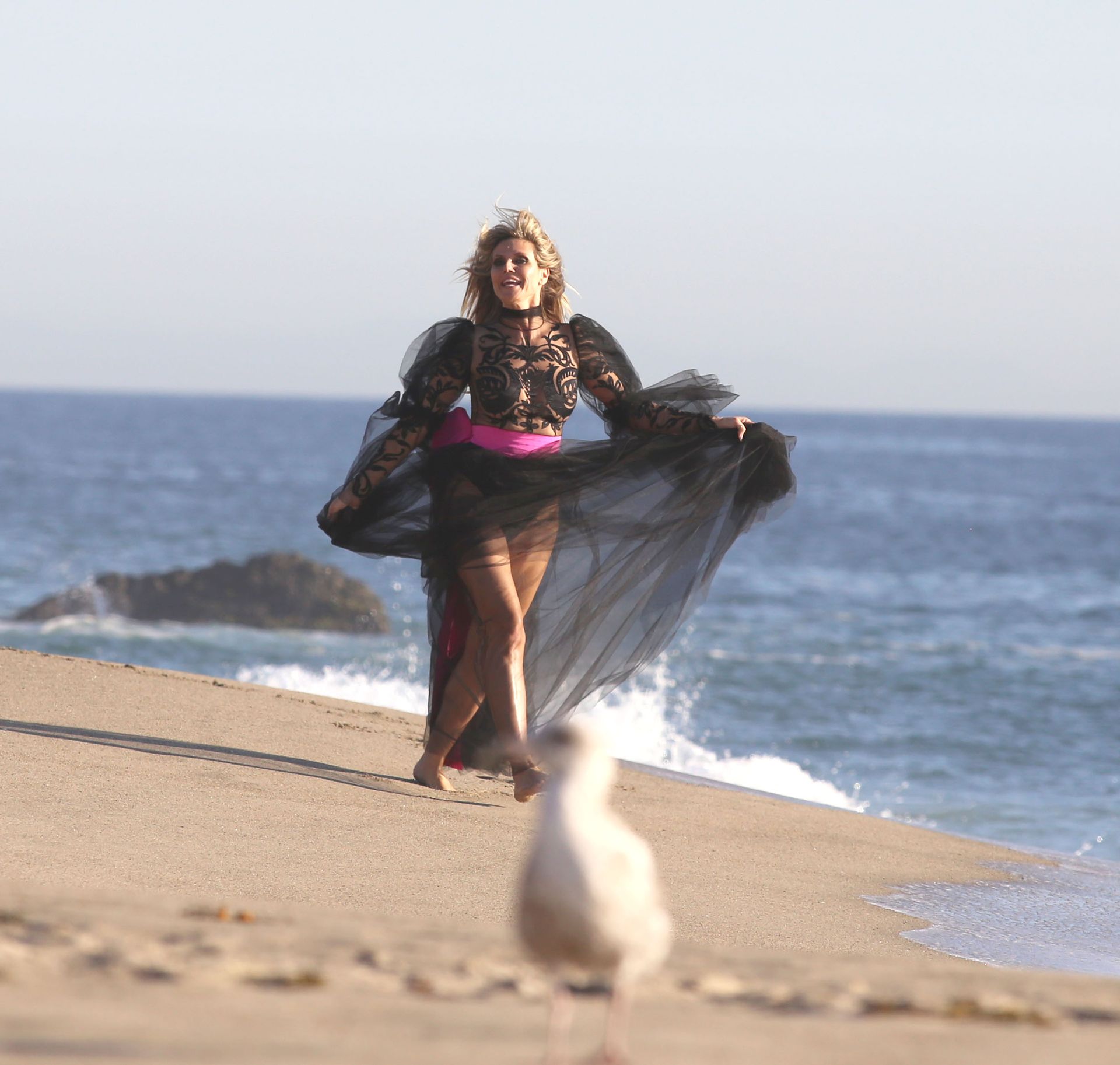 Heidi Klum Poses In A Thong Bikini 0016