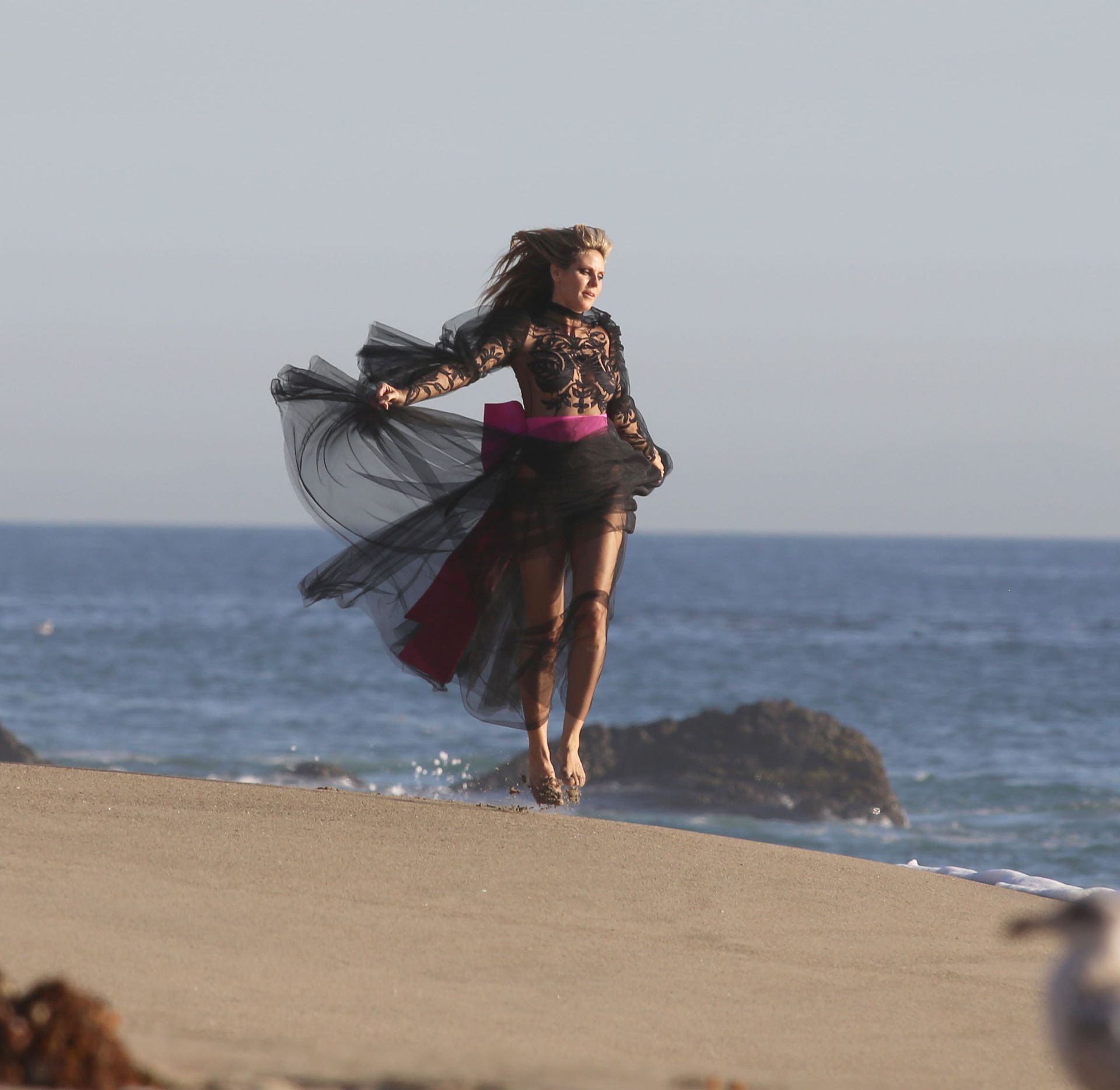 Heidi Klum Poses In A Thong Bikini 0052