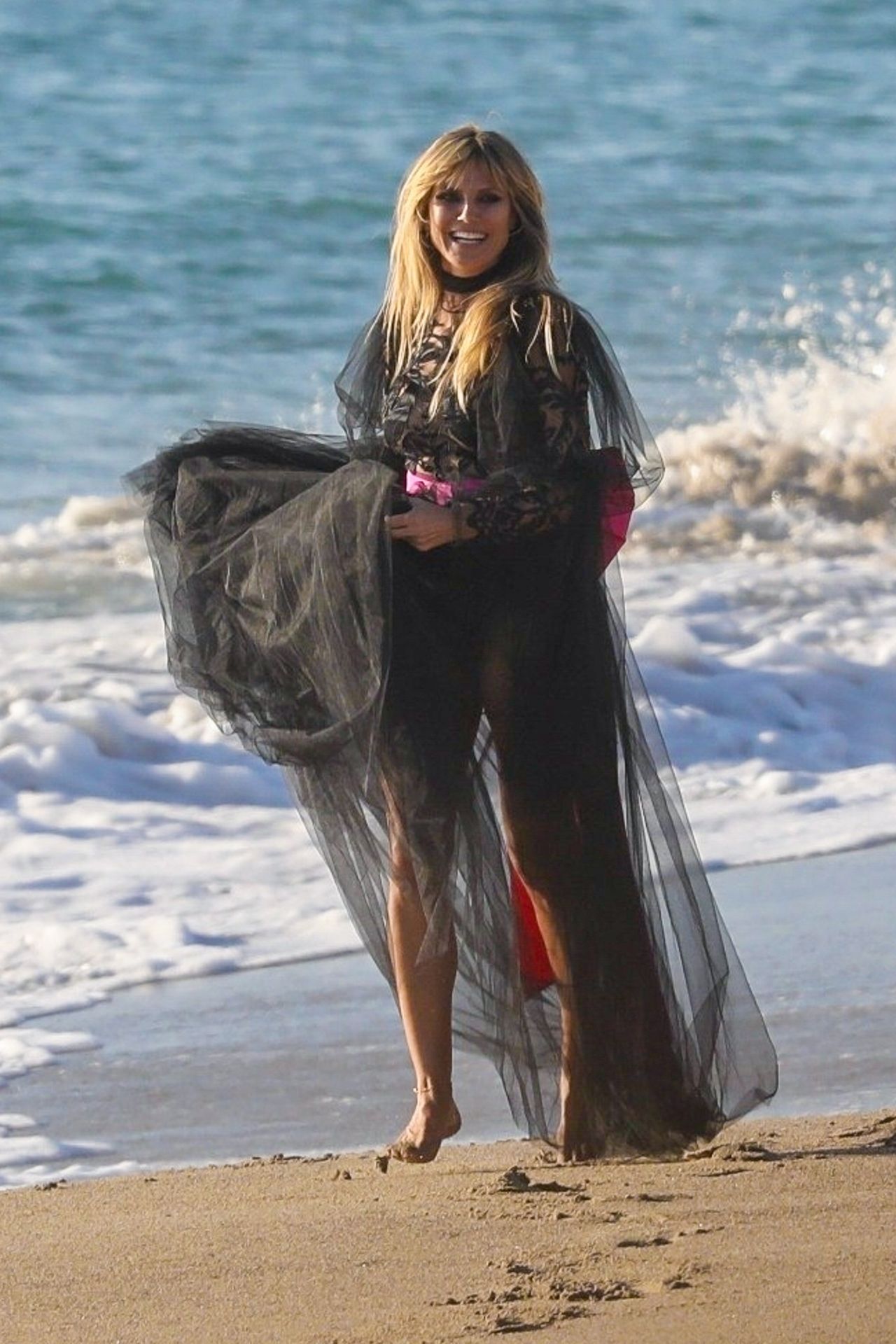 Heidi Klum Poses In A Thong Bikini 0091