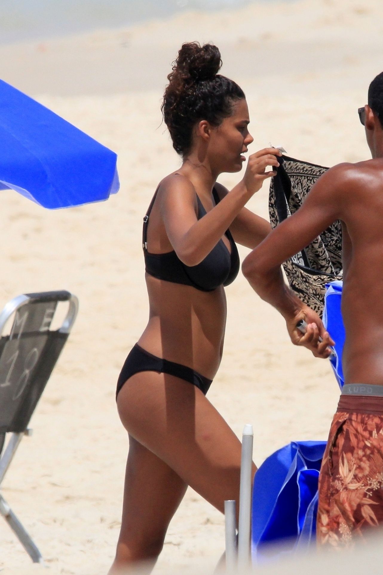Tina Kunakey Enjoys The Rio Sunshine In A Sexy Black Bikini 0009