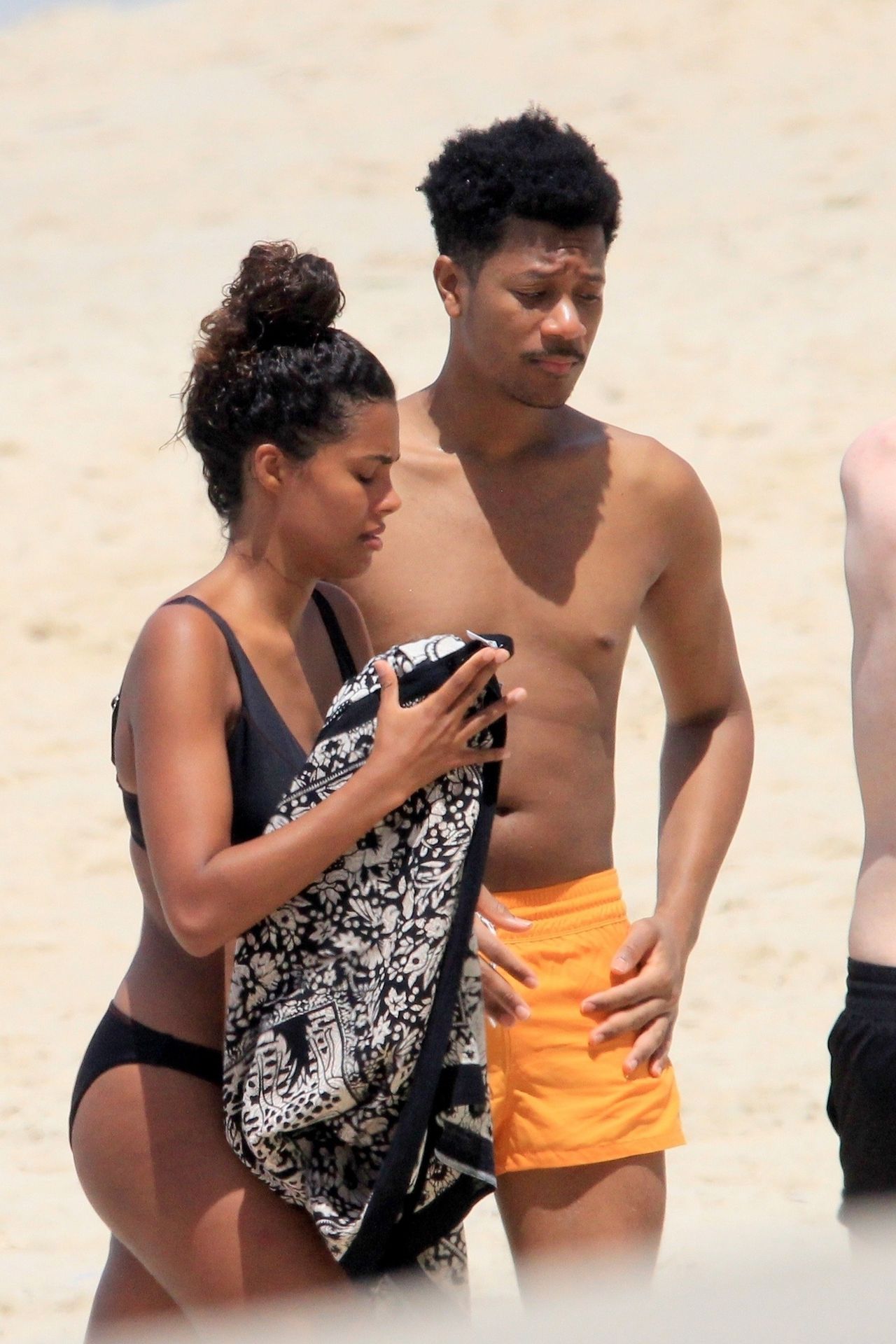 Tina Kunakey Enjoys The Rio Sunshine In A Sexy Black Bikini 0010