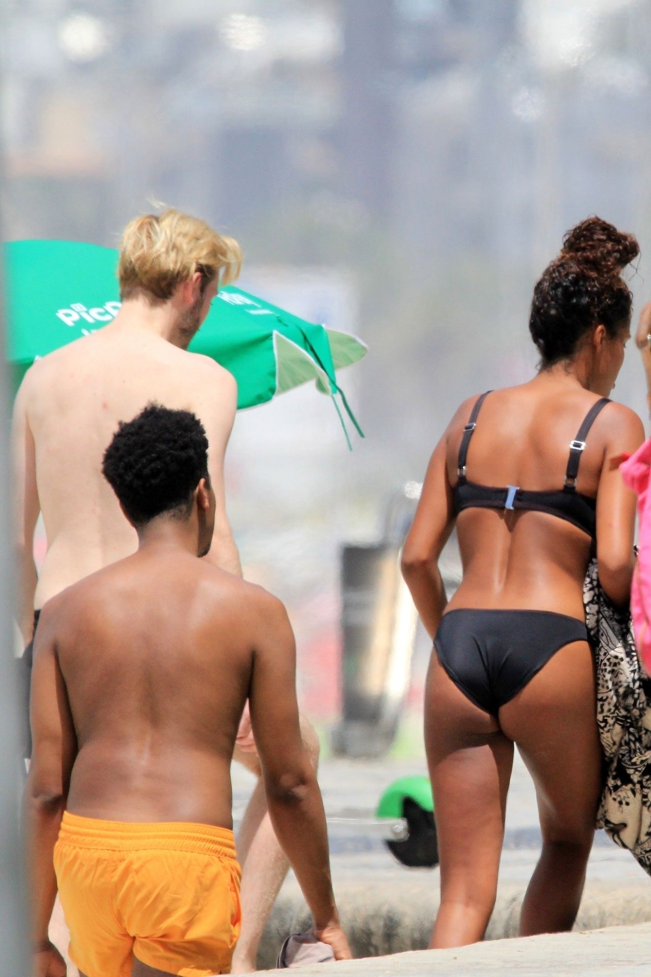 Tina Kunakey Enjoys The Rio Sunshine In A Sexy Black Bikini 0011