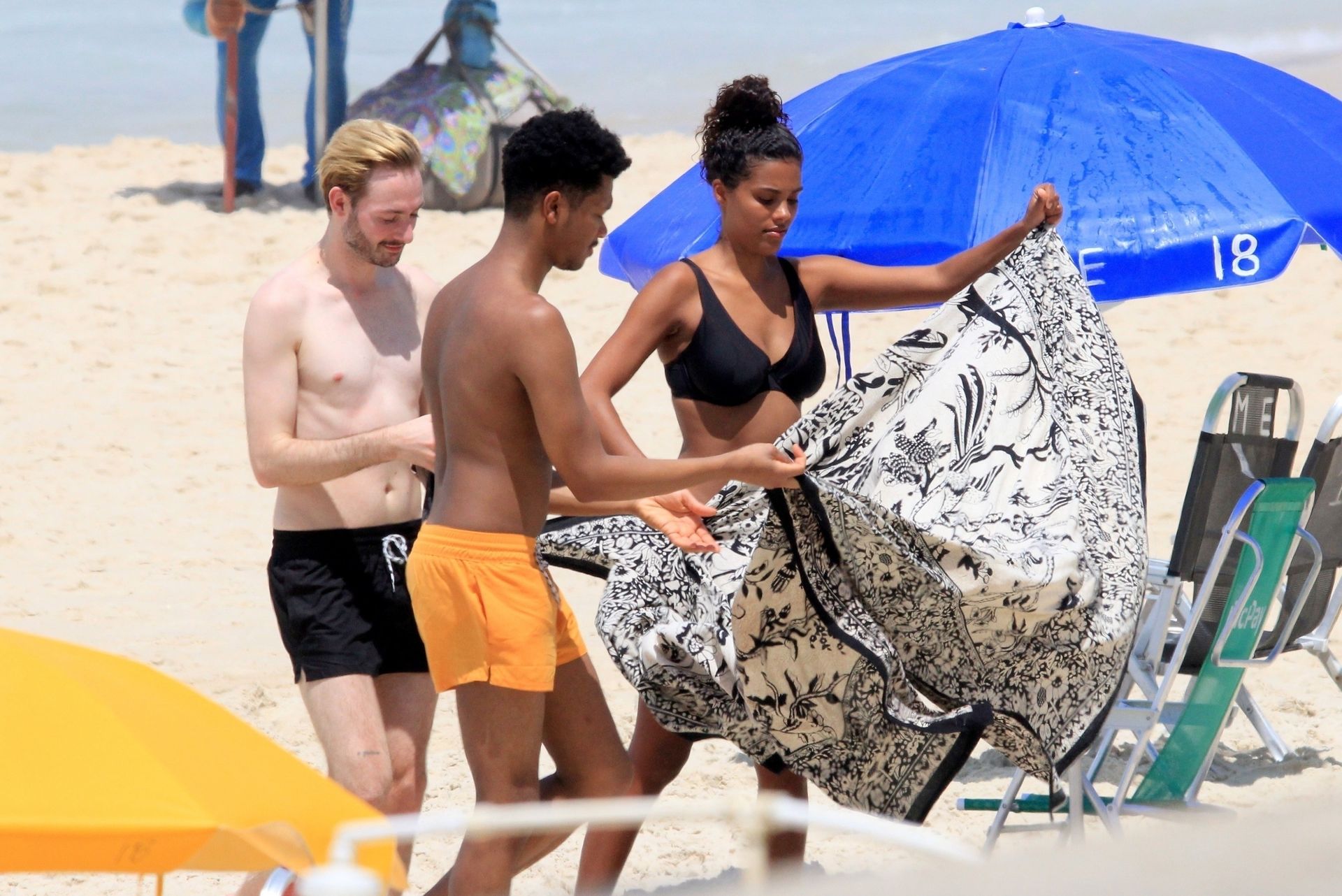 Tina Kunakey Enjoys The Rio Sunshine In A Sexy Black Bikini 0017