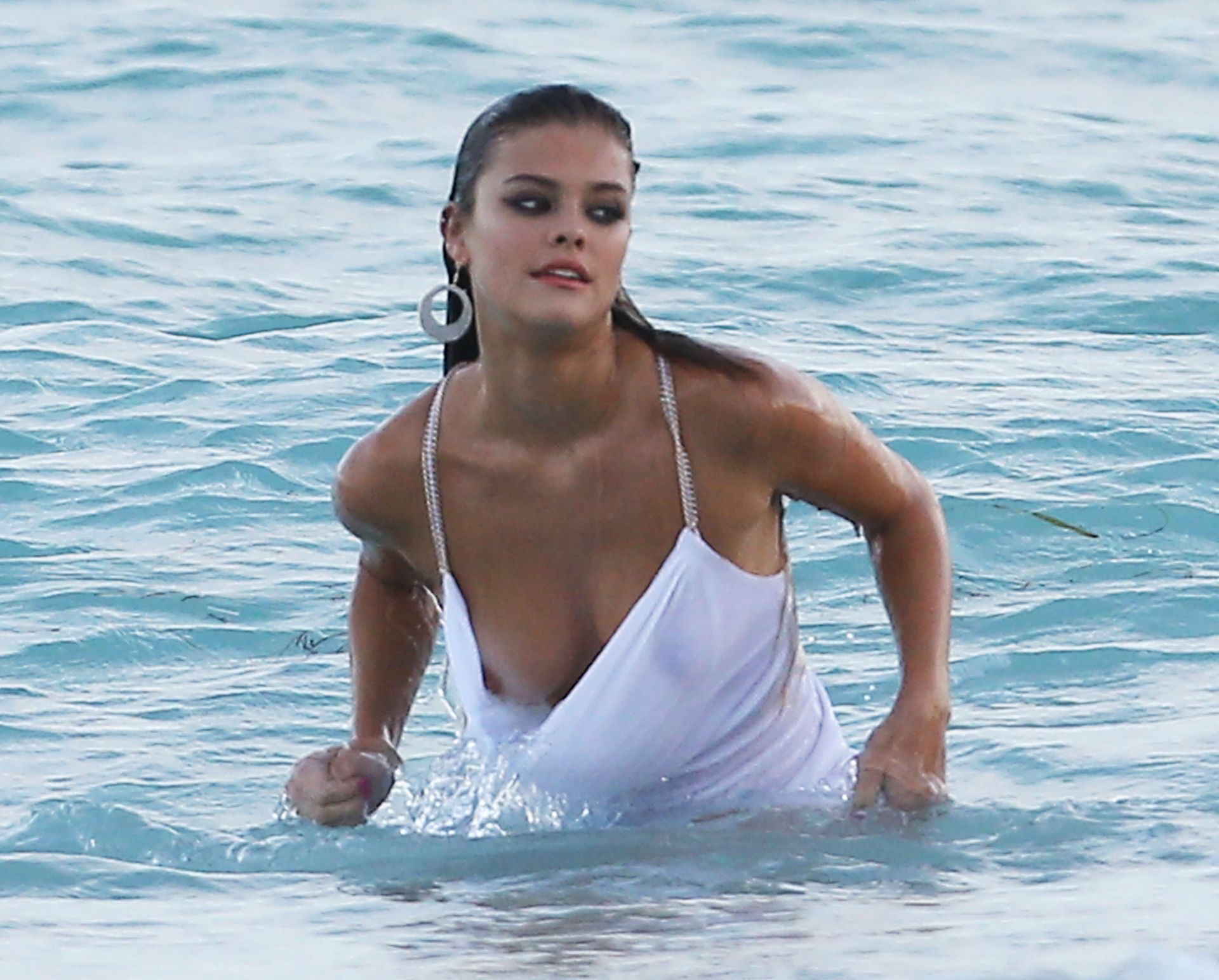 Nina Agdal Has A Couple Wardrobe Malfunctions While Navigating The Surf For A Photoshoot 0022
