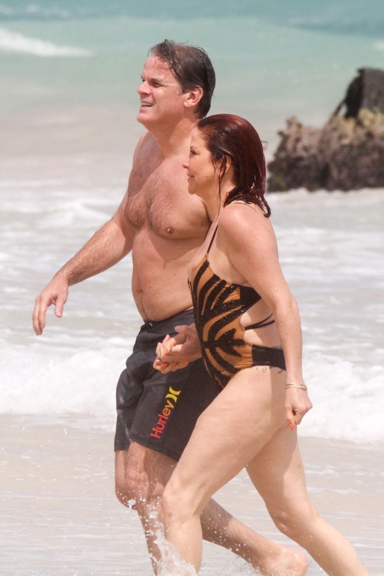 Slash’s Ex Wife Perla Ferrar Is Living Life On The Beach 0003