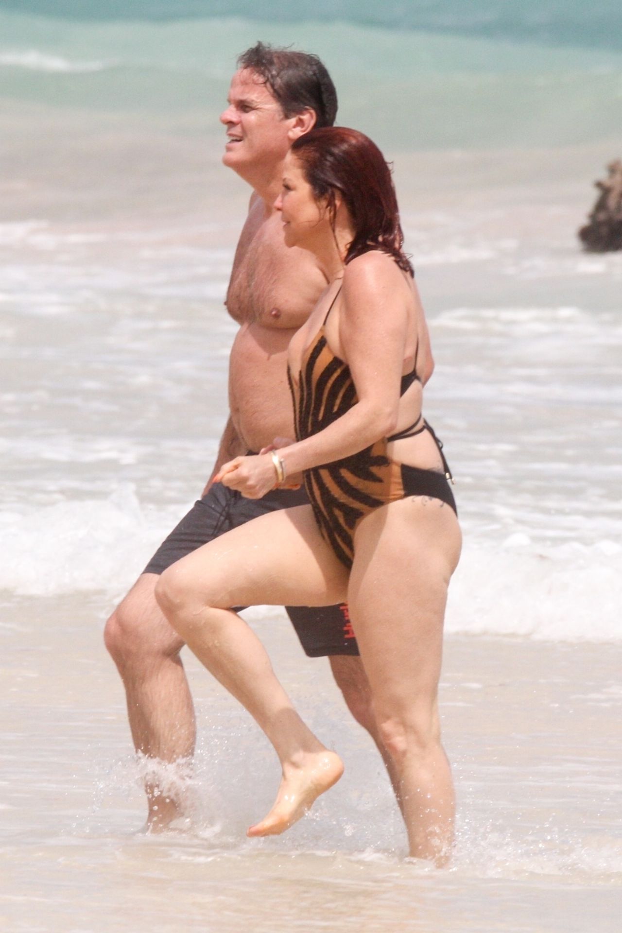 Slash’s Ex Wife Perla Ferrar Is Living Life On The Beach 0004