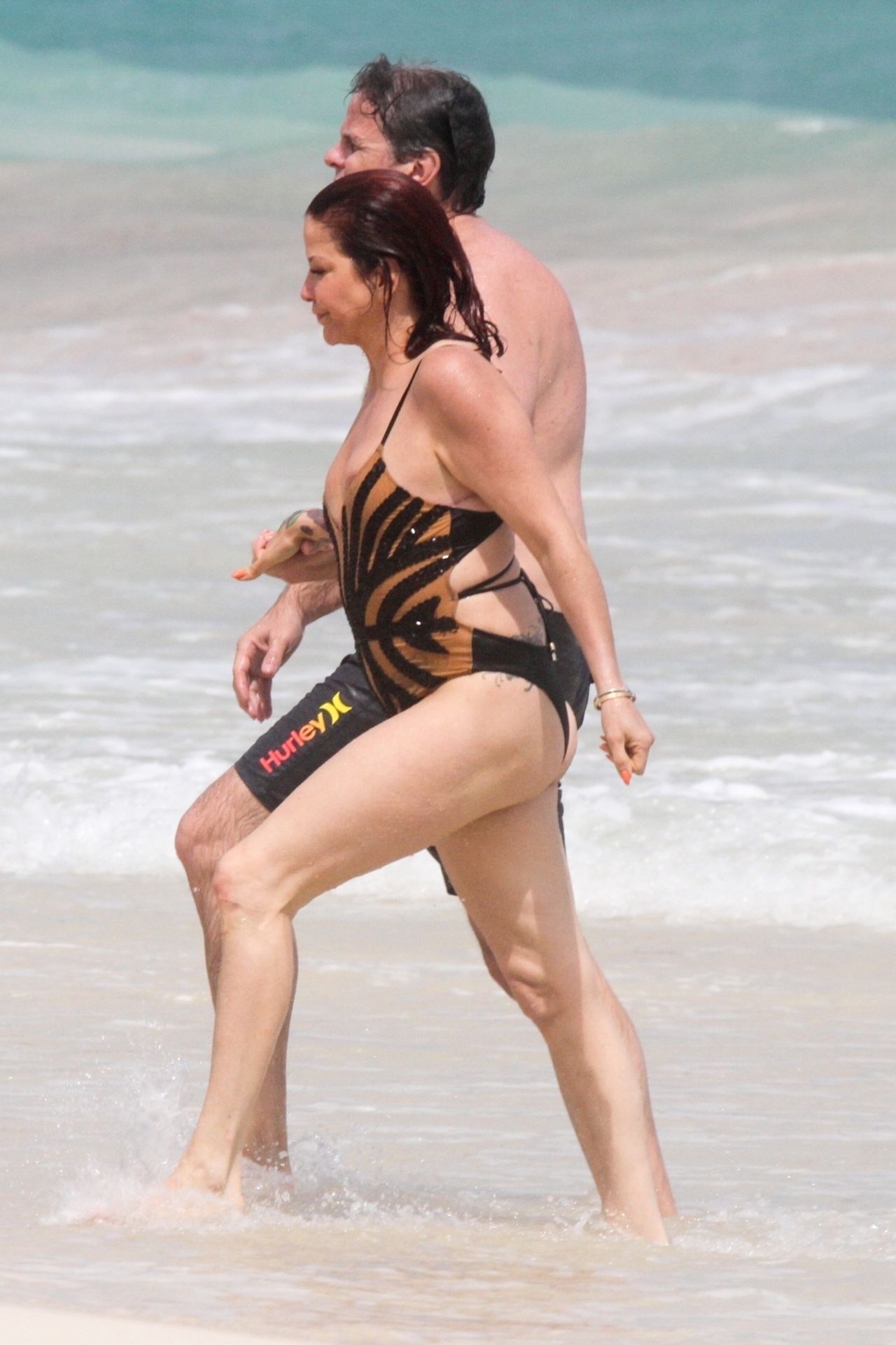 Slash’s Ex Wife Perla Ferrar Is Living Life On The Beach 0011