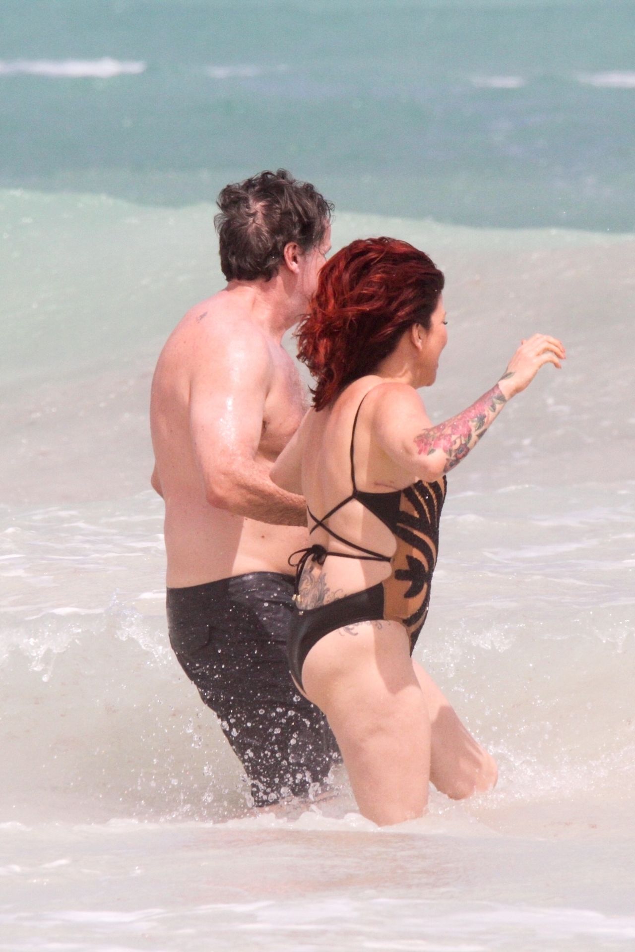 Slash’s Ex Wife Perla Ferrar Is Living Life On The Beach 0013
