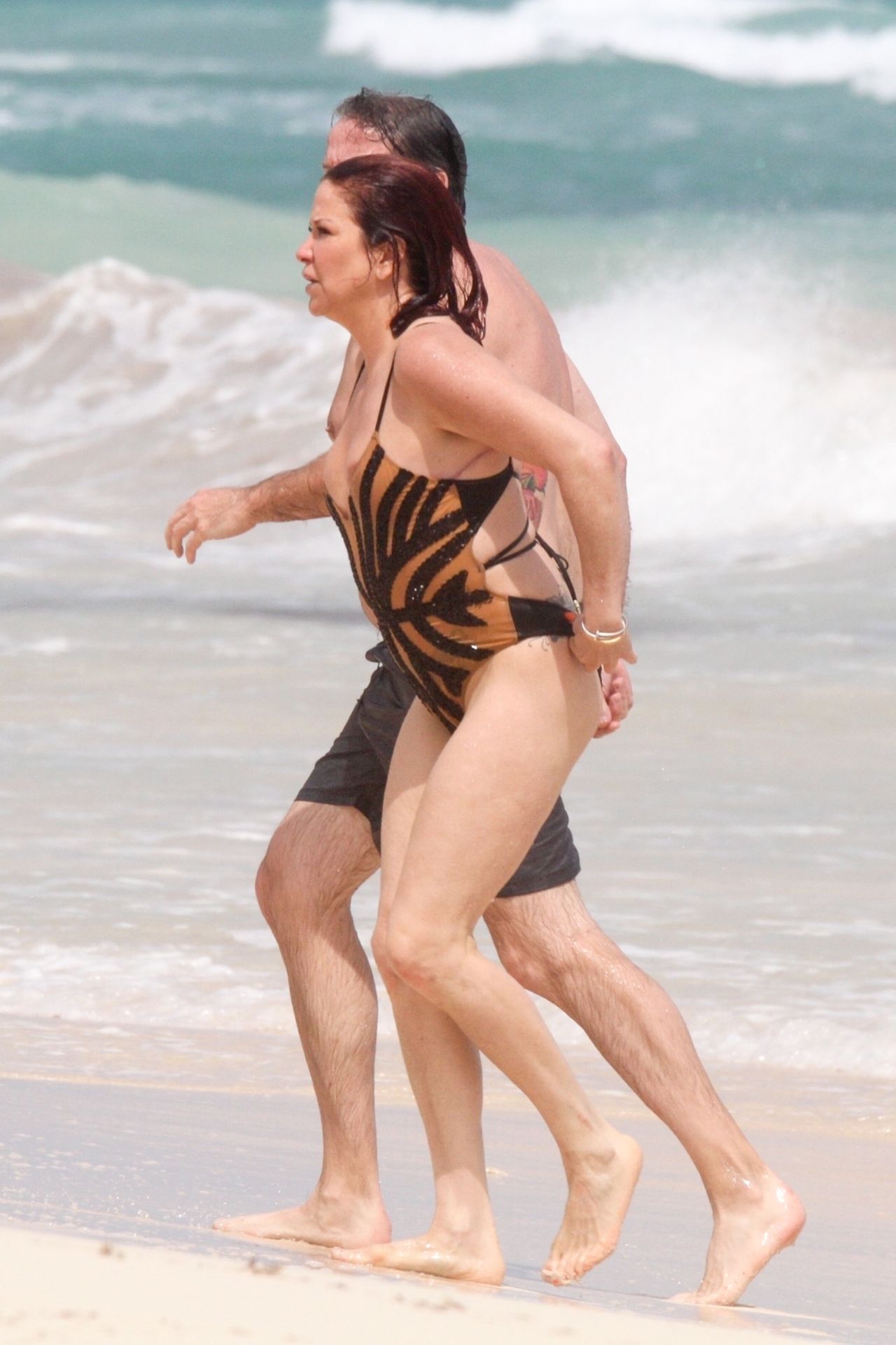 Slash’s Ex Wife Perla Ferrar Is Living Life On The Beach 0015
