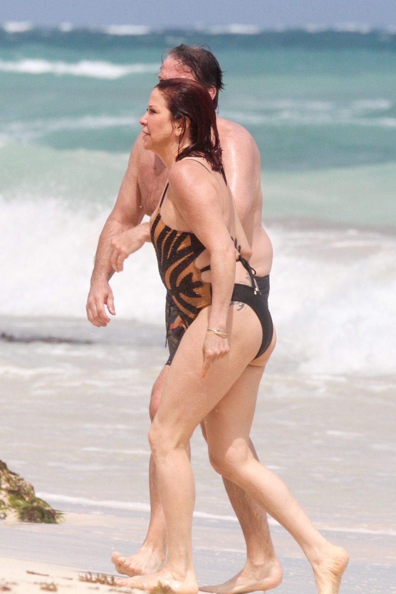 Slash’s Ex Wife Perla Ferrar Is Living Life On The Beach 0018