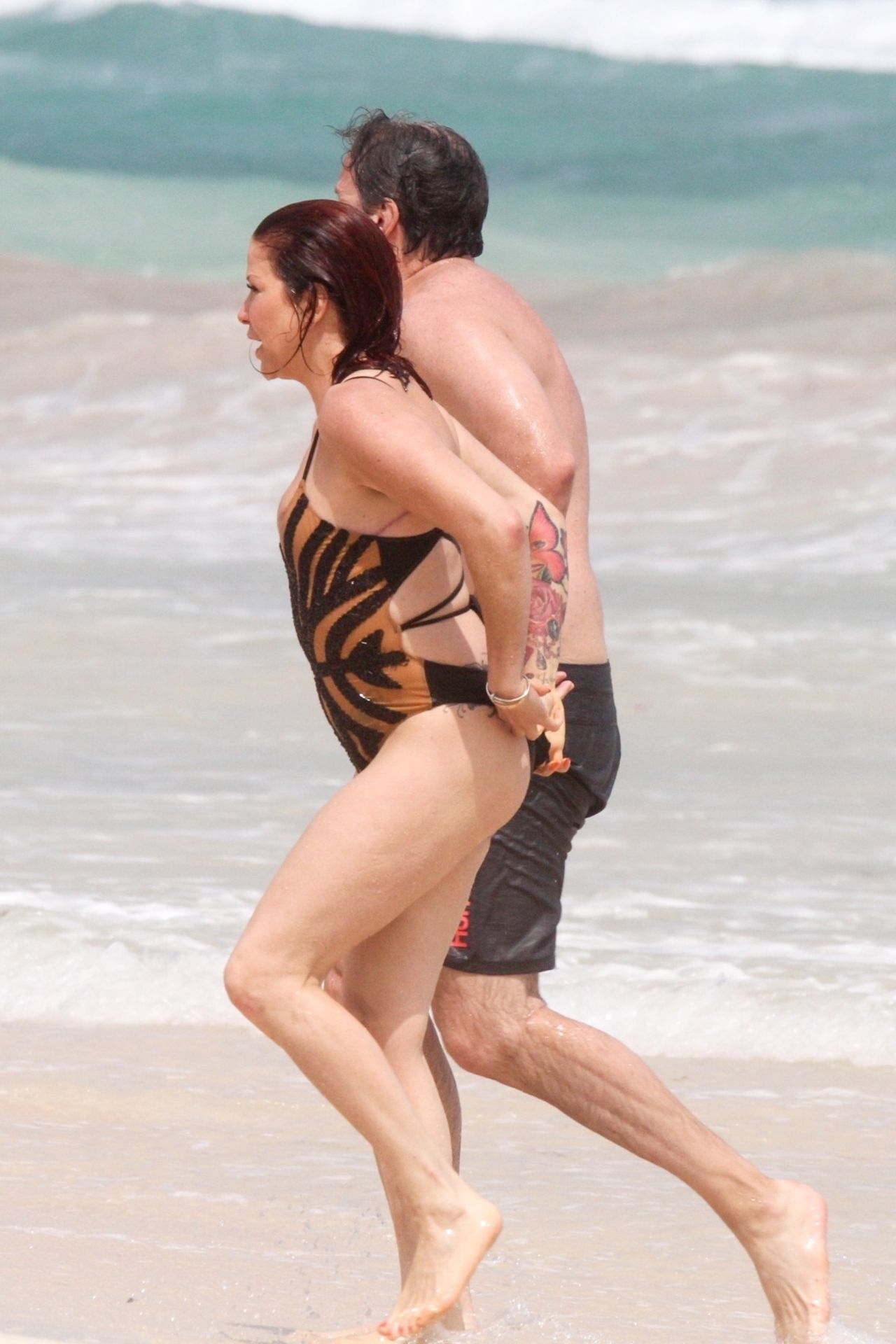 Slash’s Ex Wife Perla Ferrar Is Living Life On The Beach 0019