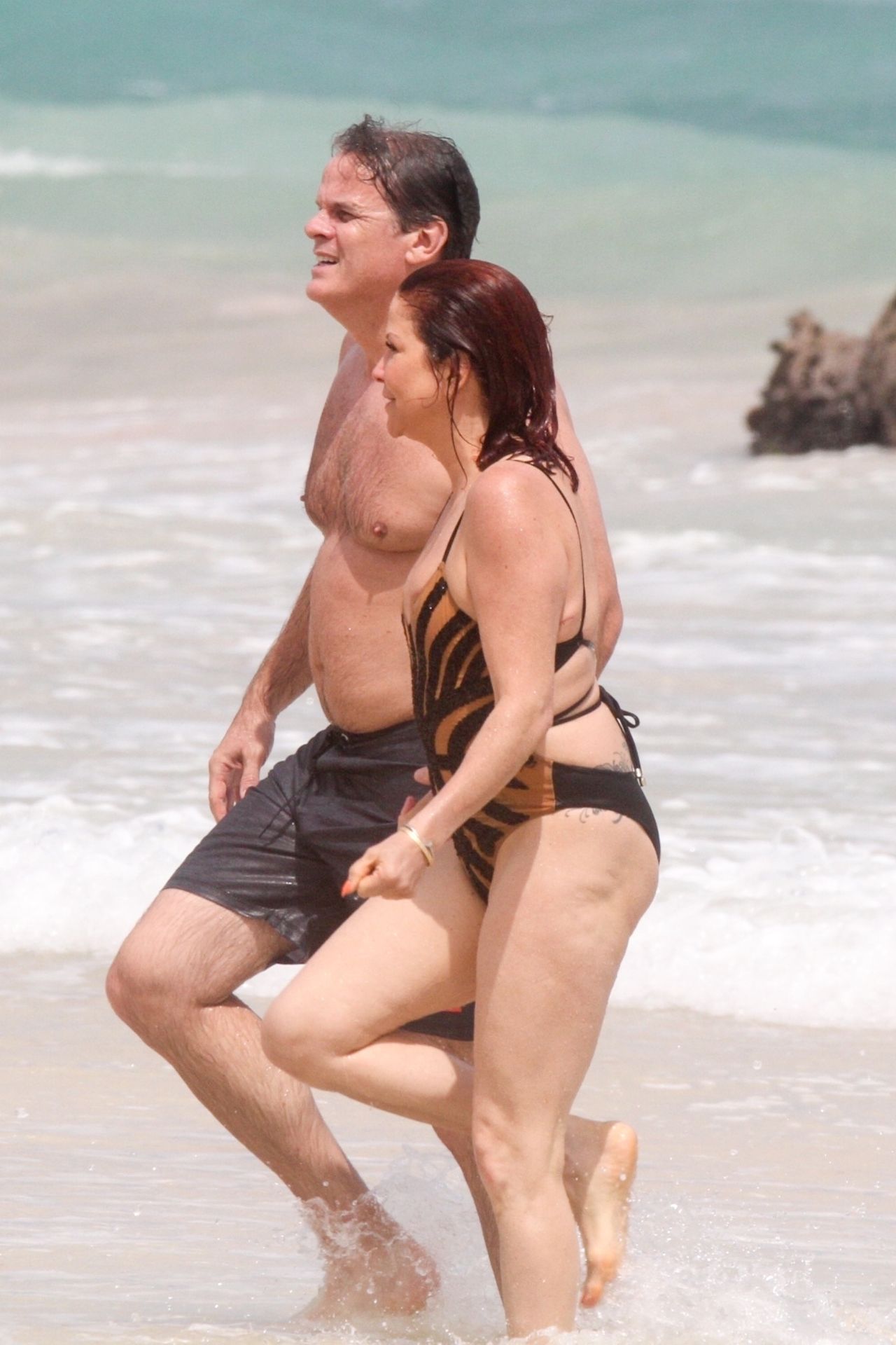 Slash’s Ex Wife Perla Ferrar Is Living Life On The Beach 0020