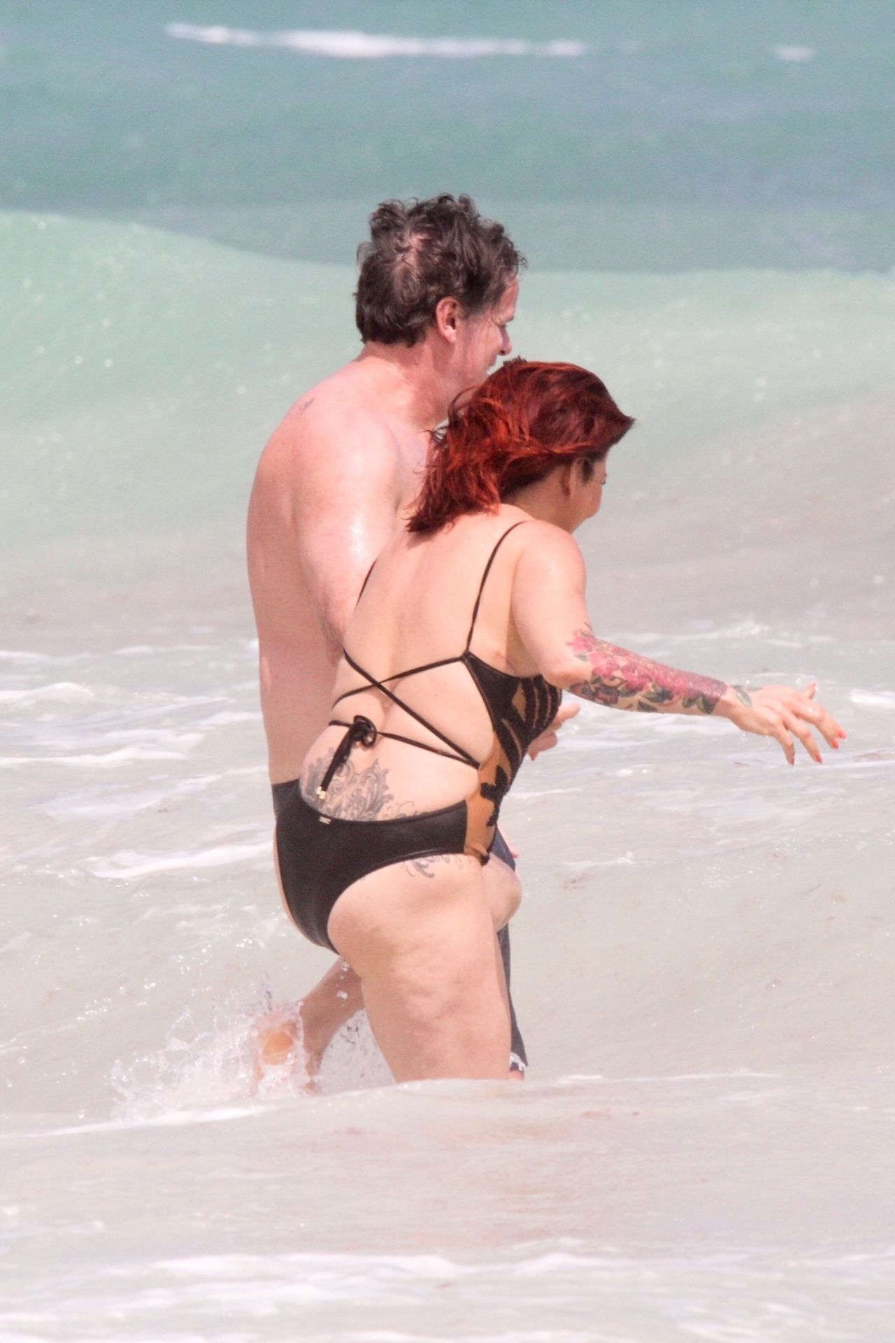 Slash’s Ex Wife Perla Ferrar Is Living Life On The Beach 0023