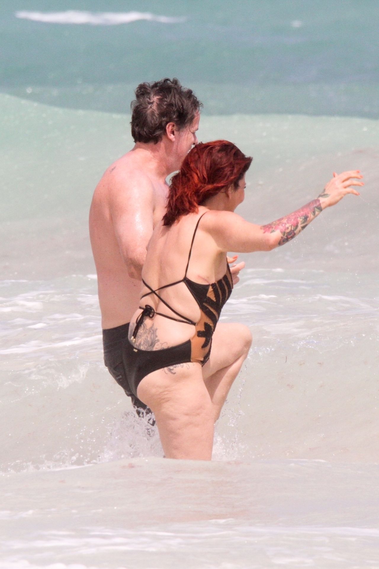 Slash’s Ex Wife Perla Ferrar Is Living Life On The Beach 0024