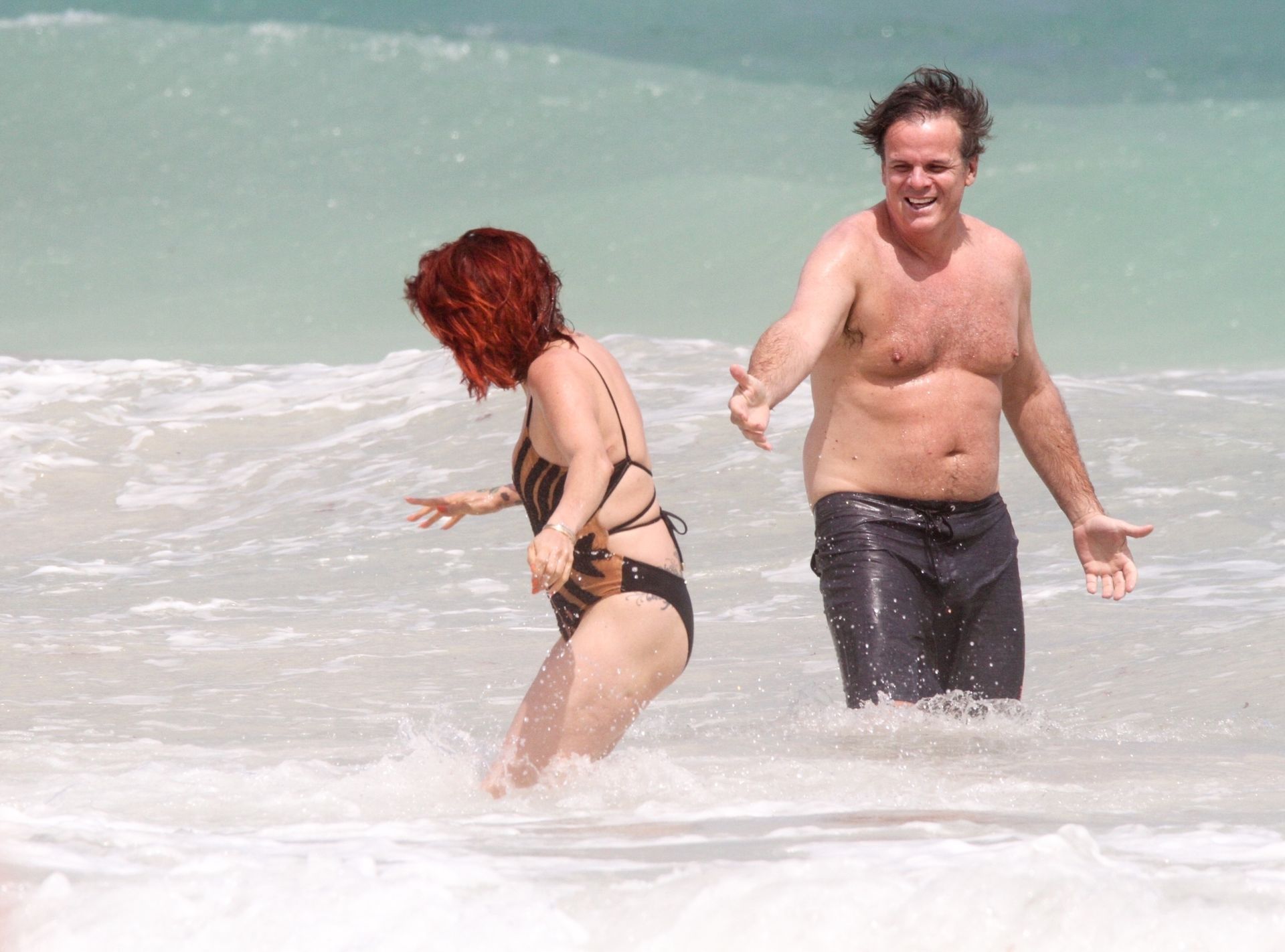 Slash’s Ex Wife Perla Ferrar Is Living Life On The Beach 0025